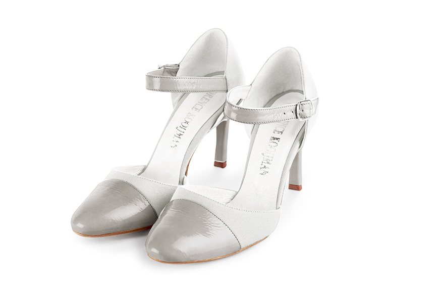 French elegance and refinement for these pearl grey and pure white dress open side shoes, with an instep strap, 
                available in many subtle leather and colour combinations. Its high vamp and fitted strap will give you good support.
To personalize or not, according to your inspiration and your needs.  
                Matching clutches for parties, ceremonies and weddings.   
                You can customize these shoes to perfectly match your tastes or needs, and have a unique model.  
                Choice of leathers, colours, knots and heels. 
                Wide range of materials and shades carefully chosen.  
                Rich collection of flat, low, mid and high heels.  
                Small and large shoe sizes - Florence KOOIJMAN